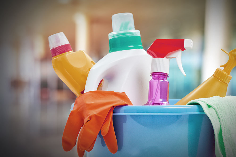 Blue Cleaning Bucket filled with cleaning supplies and orange plastic gloves